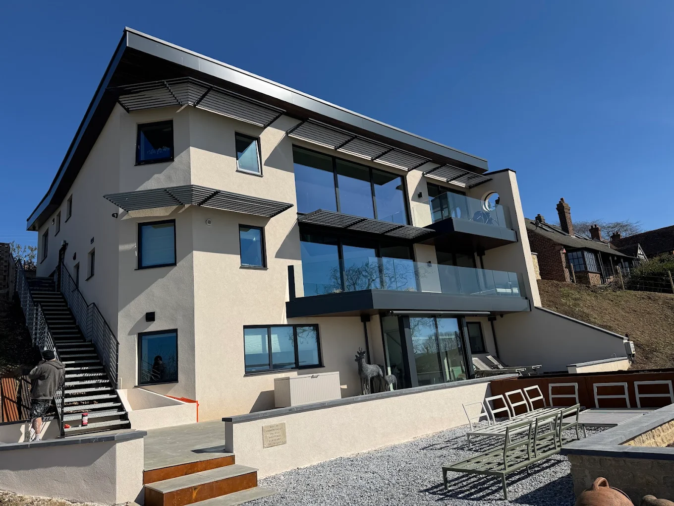 Parex EWI system installation in Little Staughton with insulation boards fixed to the exterior walls of a residential property.